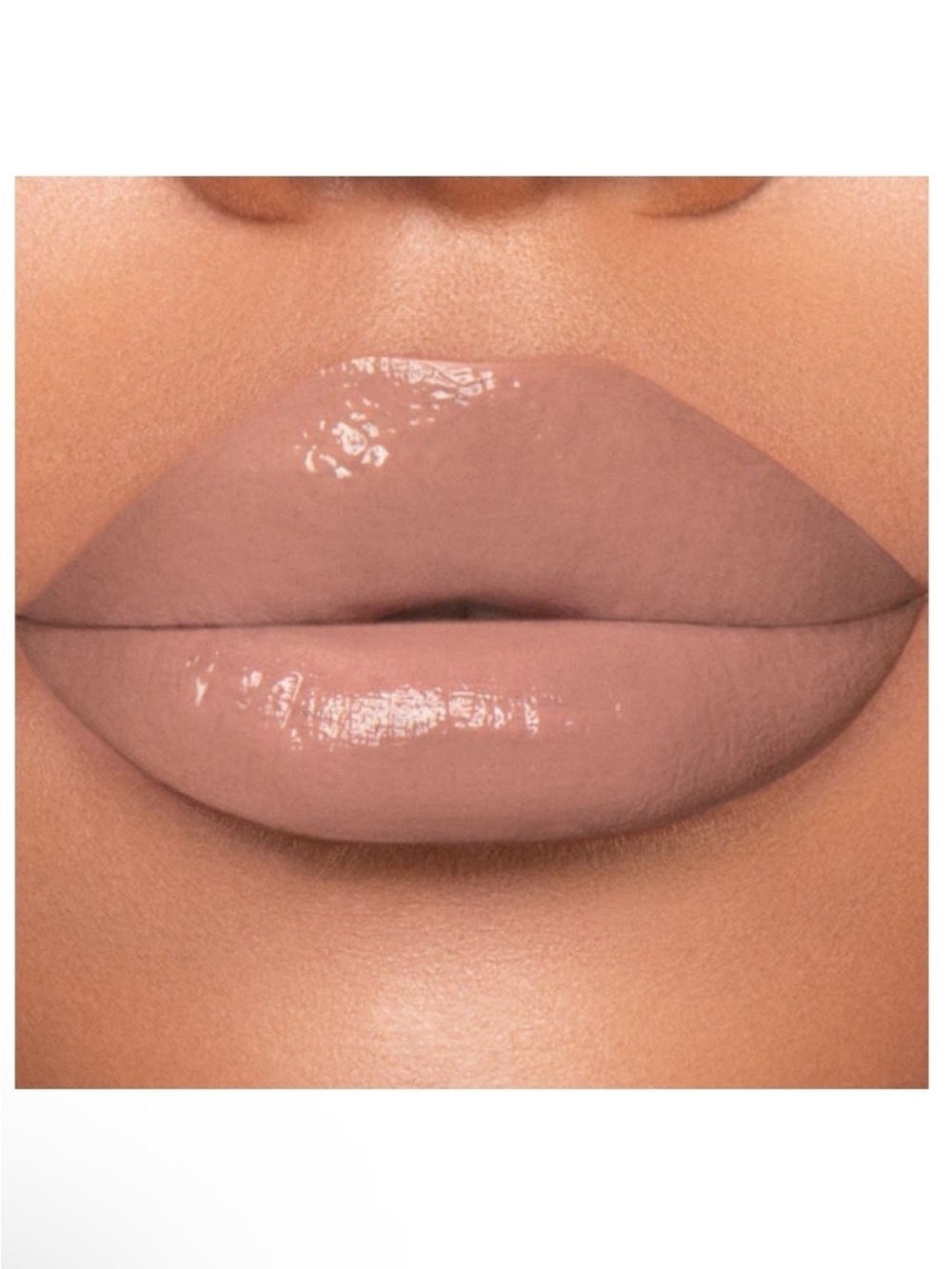 Jeffrey Star Supreme Gloss color Naked In The Dark, light nude w grey tones